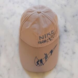 NWOT. Nike Tan Hat with Logo and Design.